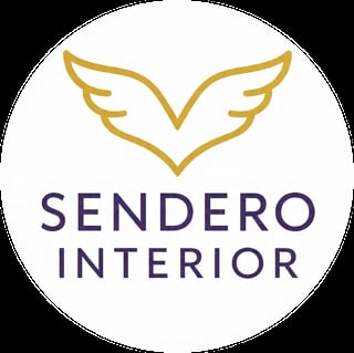 Sendero Interior logo with gold winged emblem and navy text on white circular background